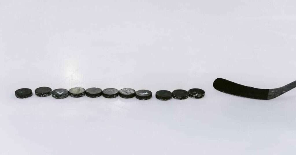 Five-Hockey-Pucks